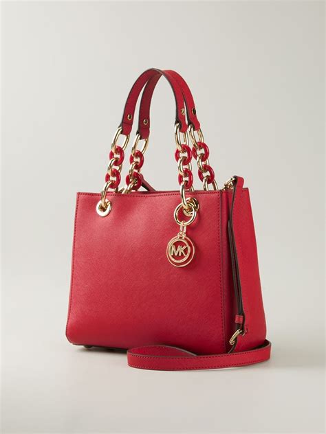 red michael kors bag sale|Michael Kors backpack red.